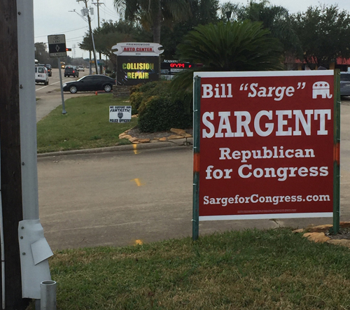 Weber Campaign places signs so as to obscure those of his opponent!